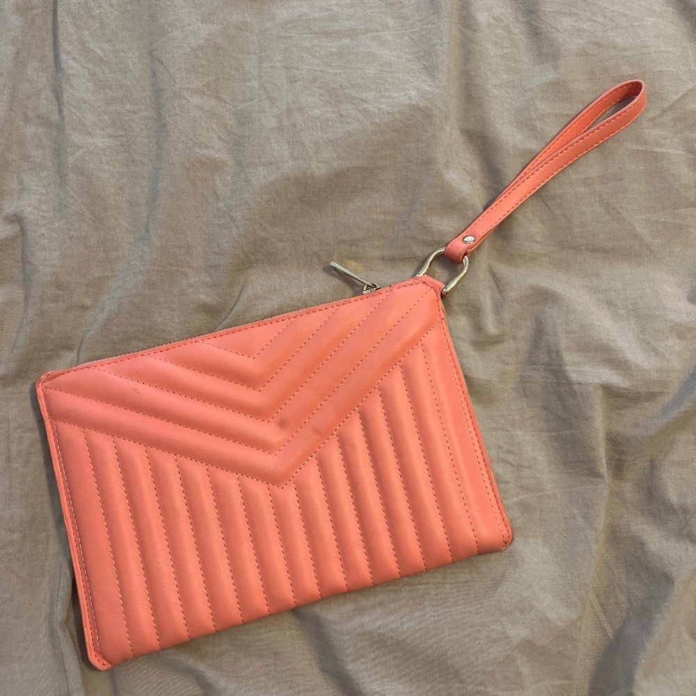 Puffy, pink clutch